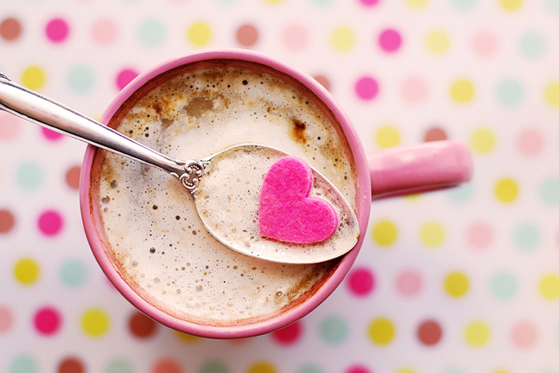 Pink Scottish Mugs with little heart details, full of hot cocoa. 